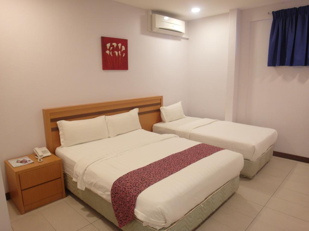 Transit Hotel Лабуан Номер фото