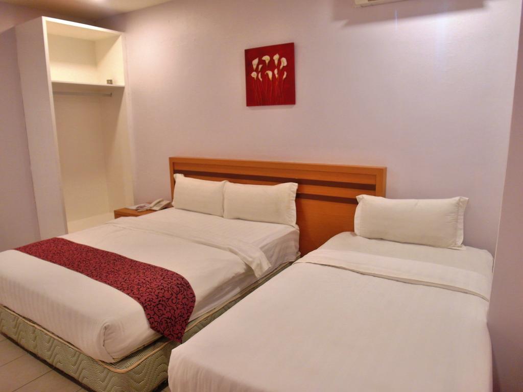 Transit Hotel Лабуан Номер фото