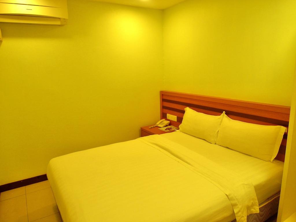 Transit Hotel Лабуан Номер фото